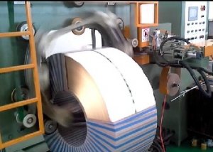 Steel coil wrapping machine for large and heavy slit coils
