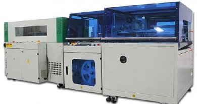 Thermal side sealing shrink wrapping machine