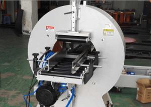 Semi-automatic horizontal orbital wrapping machine for steel rods