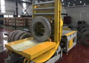 Coil downender and coil tipper with roller conveyor