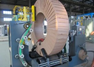 loading steel coils to coil wrapper by hoist