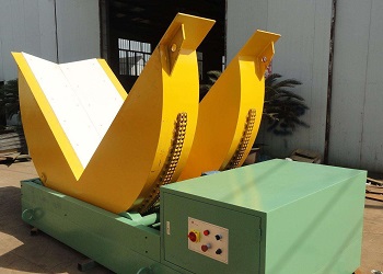 Steel coil upender with cutout for C hook loading