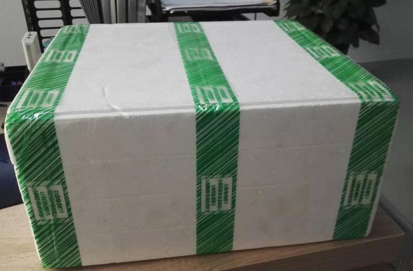 Automatic carton and foam box strapping by adhesive tape orbital wrapping